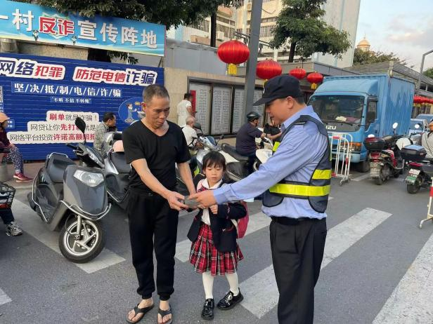 2月20日，古鎮鎮古一村關工委聯合古一村治保會在古一小學開展“反邪護苗”宣傳活動。.png