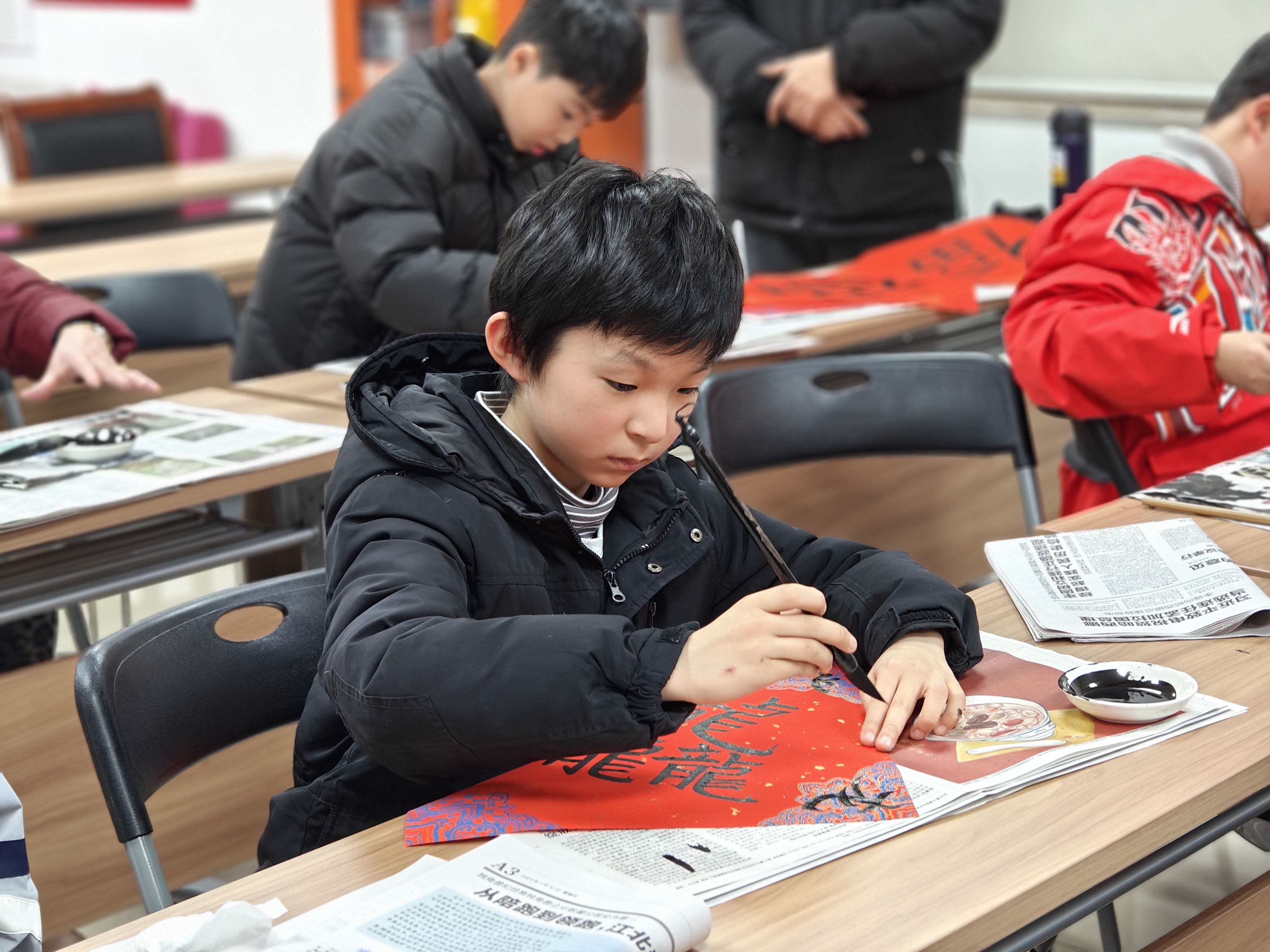 江蘇省南京市玄武區梅園新村社區關工委開展“書香伴寒假，閱讀隨我行”護苗閱讀活動（1）.jpg